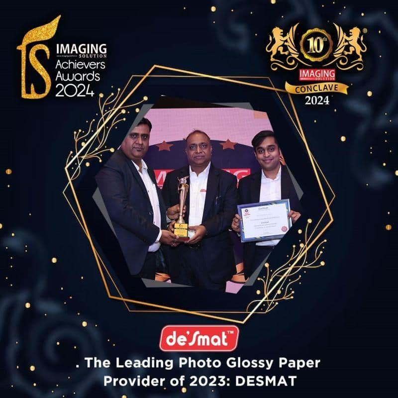 Desmat receiving the Leading Photo Glossy Paper Provider of 2023 award