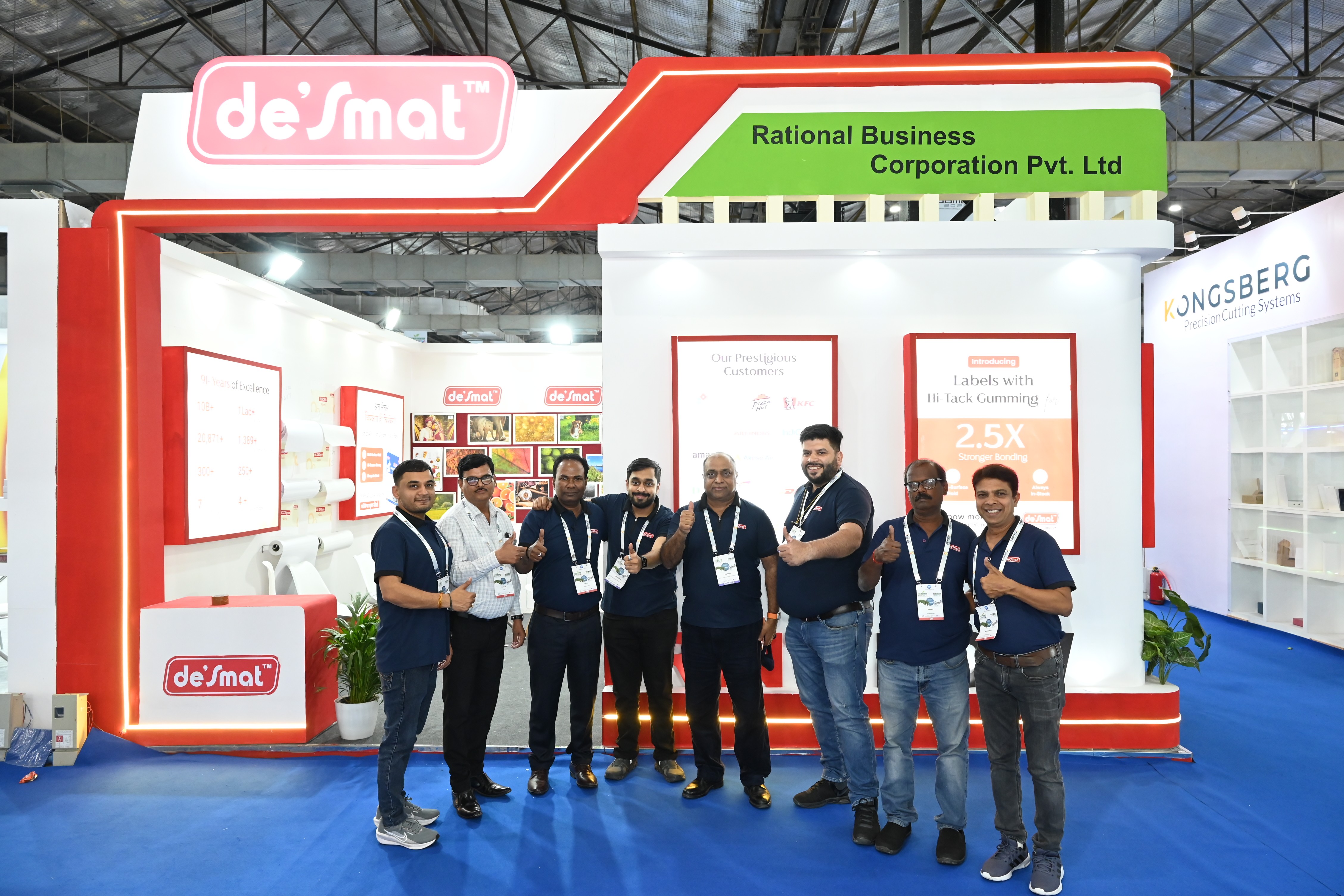 The Desmat stall at a trade exhibition, with the Desmat team in front of it